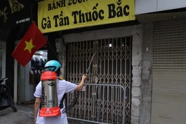 Hà Nội: Phong tỏa nhà số 112 Lò Đúc. (Ảnh: Hoàng Hiếu/TTXVN)