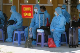 Phú Yên đón công dân từ Liên Bang Nga về cách ly theo dõi. (Ảnh: Xuân Triệu/TTXVN)