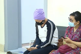 Bệnh nhân ung thư đang điều trị tại Bệnh viện K. (Ảnh: PV/Vietnam+)