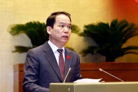 Chủ nhiệm Ủy ban Pháp luật của Quốc hội Hoàng Thanh Tùng trình bày Báo cáo giải trình, tiếp thu, chỉnh lý dự thảo Luật Công chứng (sửa đổi). (Ảnh: Doãn Tấn/TTXVN)