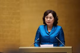 Thống đốc Ngân hàng Nhà nước Việt Nam Nguyễn Thị Hồng trình bày Báo cáo tổng kết. (Ảnh: Dương Giang/TTXVN)