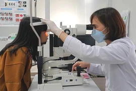 Các bệnh nhân khám, điều trị tại Bệnh viện Mắt Cao Nguyên, thành phố Pleiku, tỉnh Gia Lai. (Ảnh: Hoài Nam/TTXVN)