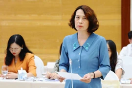 Thứ trưởng Bộ Y tế Nguyễn Thị Liên Hương trả lời tại cuộc họp. (Ảnh: Minh Đức/TTXVN)