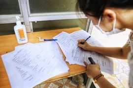 Hà Nội rà soát, xét nghiệm COVID-19 tất cả người trở về từ Đà Nẵng. (Ảnh: Thành Đạt/TTXVN)