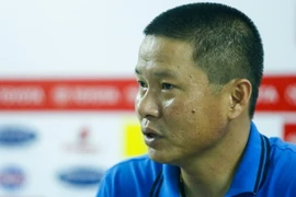 Hình ảnh khiêm tốn của ông Nghiêm trái ngược với phong độ tưng bừng mà học trò ông đang thể hiện. (Ảnh: Minh Chiến/Vietnam+)