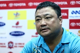 Việt Hoàng bình thản đón nhận thất bại đầu tiên trong mùa giải. (Ảnh: Minh Chiến/Vietnam+)