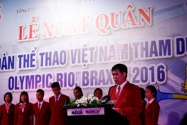 Trưởng đoàn Trần Đức Phấn tuyên bố quyết tâm trong lễ xuất quân của thể thao Việt Nam. (Ảnh: Minh Chiến/Vietnam+)