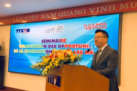 Phó Tổng giám đốc Thông tấn xã Việt Nam Lê Quốc Minh phát biểu khai mạc hội thảo. (Ảnh: Hà My/Vietnam+)