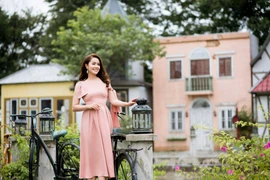 Phụ nữ hạnh phúc, tự nhiên sẽ xinh đẹp, thần thái, ca sỹ Ngọc Anh cho biết. (Ảnh: Thanh Lê/Vietnam+)