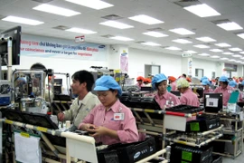 Dây chuyền sản xuất của Công ty Samsung Electronics Việt Nam tại Khu công nghiệp Yên Phong. (Ảnh: Danh Lam/TTXVN)