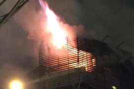 Hiện trường vụ cháy tại số 136 Trần Duy Hưng, Cầu Giấy, Hà Nội. (Ảnh: PV/Vietnam+)