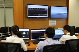 Kho bạc Nhà nước phát hành thành công 19.650 tỷ đồng trái phiếu và Ngân hàng Chính sách Xã hội phát hành được 12.300 tỷ đồng trái phiếu. (Ảnh: Vietnam+)