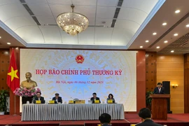 Bộ trưởng, Chủ nhiệm Văn phòng Chính phủ Trần Văn Sơn chủ trì họp báo Chính phủ thường kỳ tháng 11/2023, ngày 6/12. (Ảnh: Vietnam+)