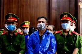 Bị cáo Nguyễn Minh Khải tại phiên tòa ngày 30/11. (Ảnh: Thành Chung/TTXVN)