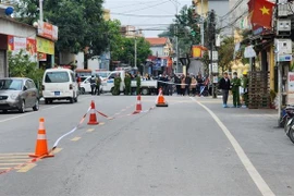 Hiện trường vụ án mạng nghiêm trọng. (Ảnh: Thái Hùng/TTXVN)