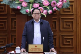Thủ tướng Phạm Minh Chính chủ trì họp Thường trực Chính phủ về chính sách tài khóa, tiền tệ. (Ảnh: Dương Giang/TTXVN)