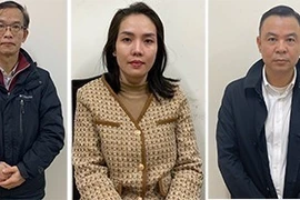 Các bị can Vũ Hồng Quang, Lý Tiến Hùng, Nguyễn Thị Hiền, Đào Minh Dương, Phạm Thị Kim Ngân (từ trái qua phải). (Ảnh: TTXVN phát)