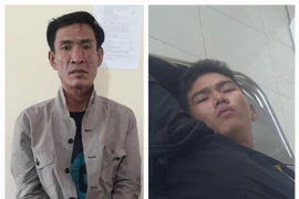 Đối tượng Lê Thành Quang (trái) và Đặng Văn Thành. (Ảnh: TTXVN phát)