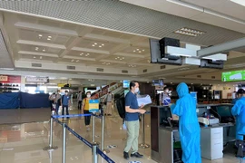 Đoàn cán bộ, nhân viên y tế của Bệnh viện Bạch Mai tham gia chống dịch tại Thành phố Hồ Chí Minh. (Ảnh: CTV/Vietnam+)