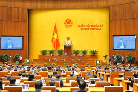 Quang cảnh phiên họp thảo luận ở hội trường Quốc hội về kết quả thực hiện kế hoạch phát triển kinh tế-xã hội năm 2021... (Ảnh: Doãn Tấn/TTXVN)