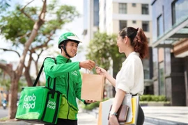 Grab mở lại dịch vụ giao đồ ăn (GrabFood) tại Hà Nội. (Ảnh: Grab)