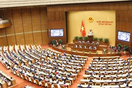 Toàn cảnh phiên thảo luận ở hội trường Quốc hội về kết quả thực hiện kế hoạch phát triển kinh tế-xã hội năm 2021 và dự kiến kế hoạch năm 2022; công tác phòng, chống dịch COVID-19. (Ảnh: Doãn Tấn/TTXVN)