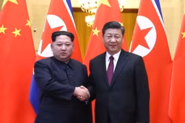 Chủ tịch Trung Quốc Tập Cận Bình hội đàm với nhà lãnh đạo Kim Jong-un. (Nguồn: THX/TTXVN)