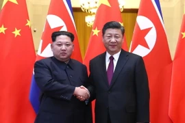 Chủ tịch Trung Quốc Tập Cận Bình hội đàm với nhà lãnh đạo Kim Jong-un. (Nguồn: THX/TTXVN)