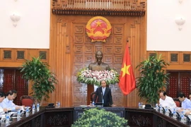 Thủ tướng Nguyễn Xuân Phúc chủ trì cuộc họp. (Ảnh: Thống Nhất/TTXVN)