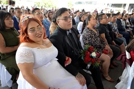 1.200 cặp đôitham gia một lễ cưới tập thể ở ngoại ô Thủ đô Mexico City (Mexico). (Nguồn: BNN Breaking)