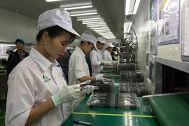 Xuất khẩu điện thoại và linh kiện đạt khoảng 27,3 tỷ USD trong 7 tháng. (Ảnh: Đức Duy/Vietnam+)
