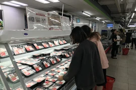 Giá thịt lợn đã dịu xuống, hiện dao động từ 66.000-70.000/kg. (Ảnh: Đức Duy/Vietnam+)