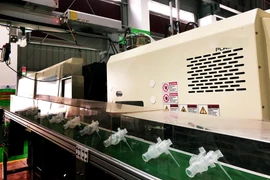 Dây chuyền sản xuất của tập đoàn An Phát. (Ảnh: Đức Duy/Vietnam+)