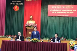 Ông Nguyễn Quang Vinh, Phó Tổng Giám đốc Kho bạc Nhà nước phát biểu tại họp báo. (Ảnh: Đức Duy/Vietnam+)