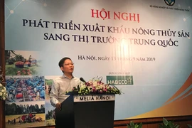 Bộ trưởng Trần Tuấn Anh phát biểu tại hội nghị phát triển xuất khẩu nông thủy sản sang thị trường Trung Quốc. (Ảnh: Đức Duy/Vietnam+)