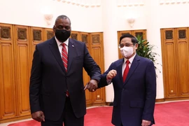 Thủ tướng Phạm Minh Chính tiếp Bộ trưởng Quốc phòng Hợp chúng quốc Hoa Kỳ Lloyd Austin. (Ảnh: Dương Giang/TTXVN)