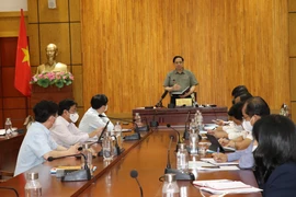 Thủ tướng Phạm Minh Chính phát biểu kết luận tại buổi làm việc. (Ảnh: Lê Đức Hoảnh/TTXVN)