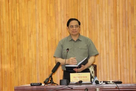 Thủ tướng Chính phủ Phạm Minh Chính phát biểu kết luận tại buổi làm việc. (Ảnh: Lê Đức Hoảnh/TTXVN)