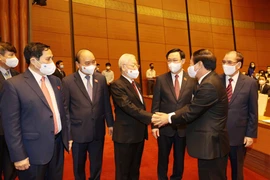 Tổng Bí thư Nguyễn Phú Trọng với các đồng chí lãnh đạo Đảng, Nhà nước tại Lễ khai mạc. (Ảnh: Trí Dũng/TTXVN)