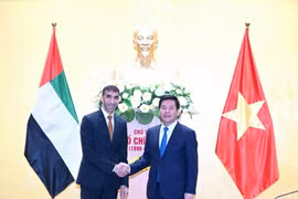 Bộ trưởng Bộ Công Thương Nguyễn Hồng Diên làm việc với ông Thani bin Ahmed Al Zeyoudi, Quốc vụ khanh phụ trách Thương mại Quốc tế, Bộ Kinh tế UAE. (Ảnh: PV/Vietnam+) 