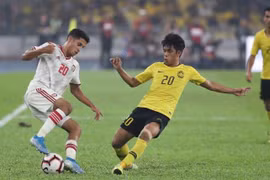 Malaysia (áo vàng) thua ngược UAE trên sân nhà. (Nguồn: AFC)