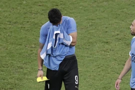 Suarez thành tội đồ khiến Uruguay dừng bước sớm. (Nguồn: Getty Images)