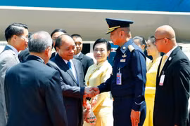 Lễ đón Thủ tướng Nguyễn Xuân Phúc và Phu nhân tại sân bay quốc tế Don Mueang, Bangkok. (Ảnh: Thống Nhất -TTXVN)