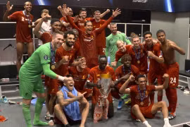 Liverpool ăn mừng trong phòng thay đồ. (Nguồn: AP)