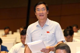 Đại biểu Quốc hội tỉnh Nam Định Vũ Xuân Trường phát biểu ý kiến thảo luận về dự án Bộ Luật Tố tụng Hình sự (sửa đổi). (Ảnh: Phương Hoa/TTXVN) 