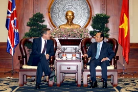 Ông Lê Thanh Hải, Bí thư Thành ủy Thành phố Hồ Chí Minh tiếp Thủ tướng Anh David Cameron. (Ảnh: Thanh Vũ/TTXVN)