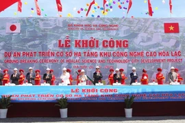 Nghi thức ấn nút Khởi công dự án Phát triển Cơ sở hạ tầng Khu Công nghệ cao Hòa Lạc. (Ảnh: Anh Tuấn/TTXVN)