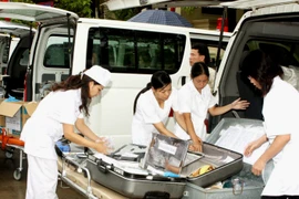 Tổ y tế phục vụ dịp Đại lễ 1.000 năm Thăng Long-Hà Nội. (Ảnh: Dương Ngọc/TTXVN)