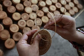 Sản xuất hàng mây tre đan xuất khẩu tại Công ty Mây tre đan xuất khẩu Ngọc Khánh, xã Phú Vinh, huyện Chương Mỹ, Hà Nội. (Ảnh: Trọng Đạt/TTXVN)