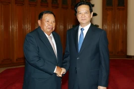 Thủ tướng Nguyễn Tấn Dũng tiếp Thường trực Ban Bí thư, Phó Chủ tịch nước Lào Bounnhang Vorachith. (Ảnh: Đức Tám/TTXVN)